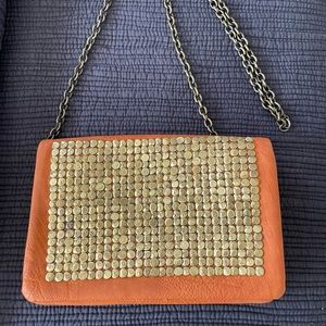 Cute gold and brown crossbody bag.